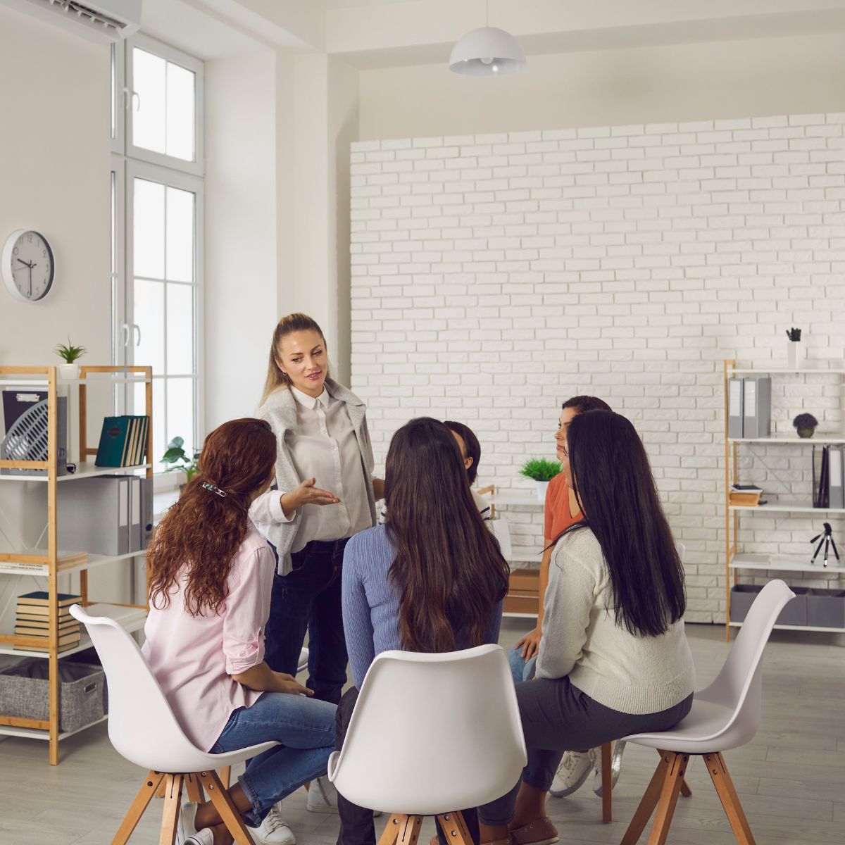 girls are sitting and discussing